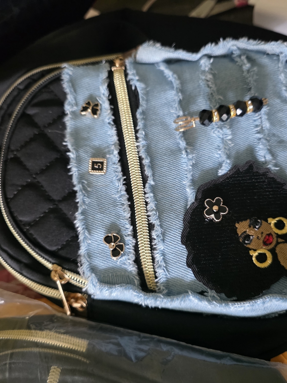 Women's Black and Light Blue Quilted Crossbody Bag with Embroidered Patch